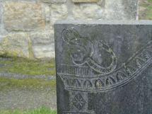 Dale Abbey, detail of serpent on tombstone