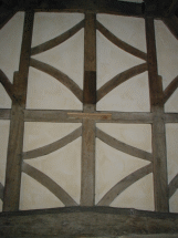 detail of west wall above gallery