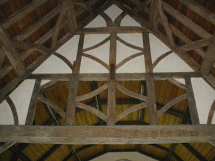 dated roof beam and queen posts